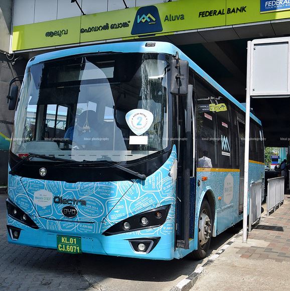 Pavan Doot Airport Feeder bus run by Kochi Metro Rail Corporation parked infront of Aluva metro station