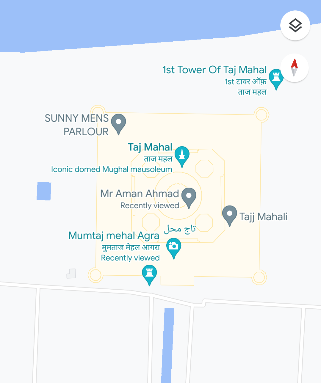 Spam markings of a parlour and some name marked over Taj Mahal in Google Maps